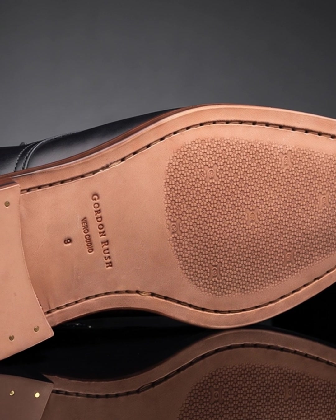 The stamped leather outsole of an Austin chukka